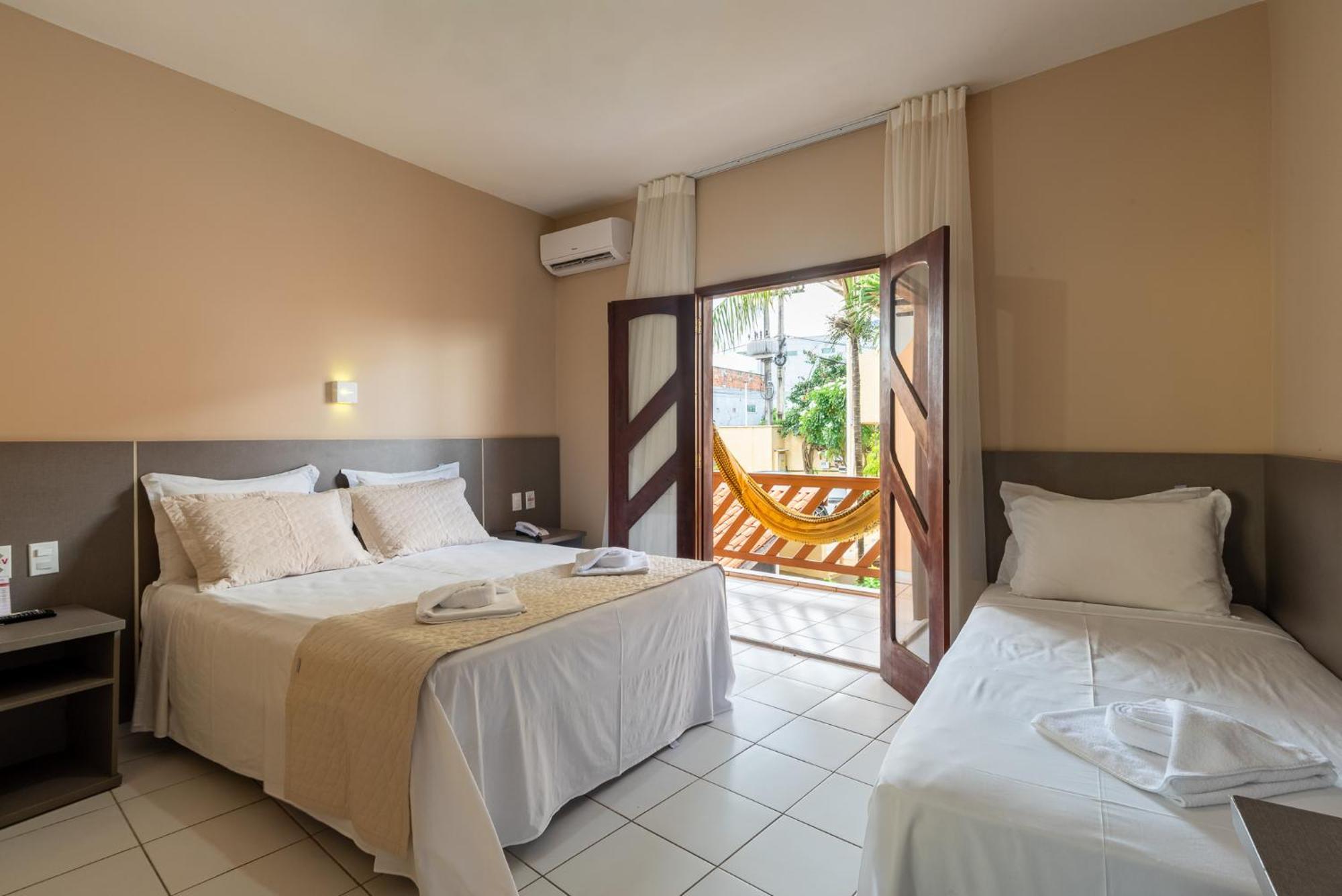 Quarto Triplo com Varanda