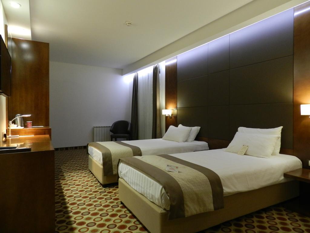Deluxe Tweepersoonskamer met 1 of 2 Bedden