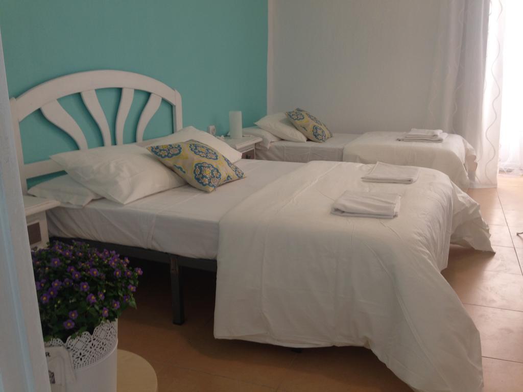 Economy Quadruple Room with Shared Bathroom,965539045:JPEG