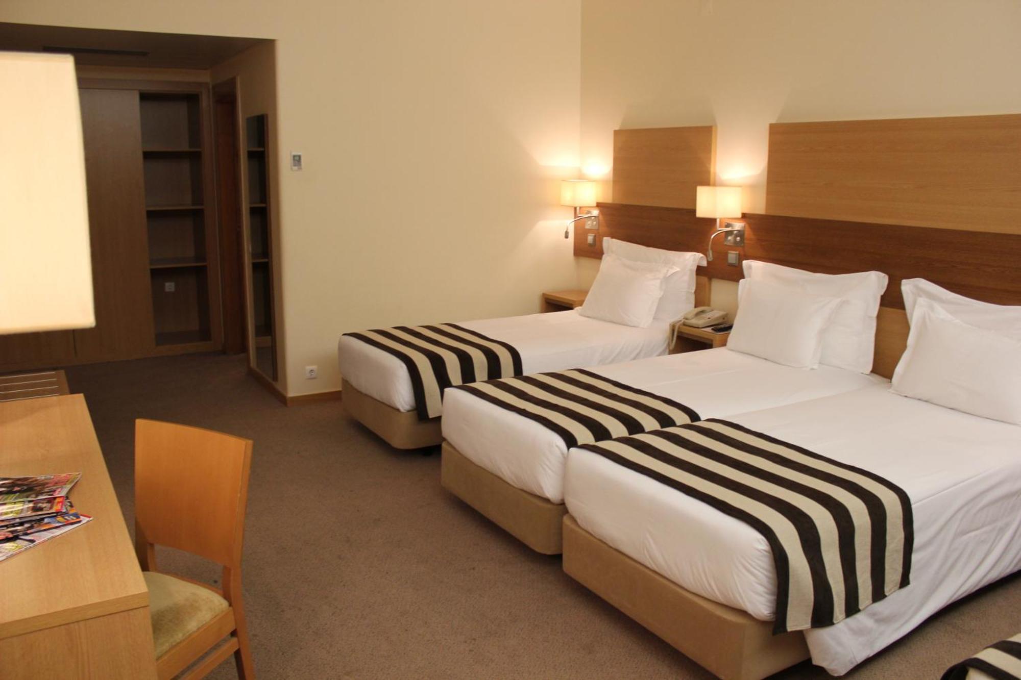 Quarto Twin com Cama Extra