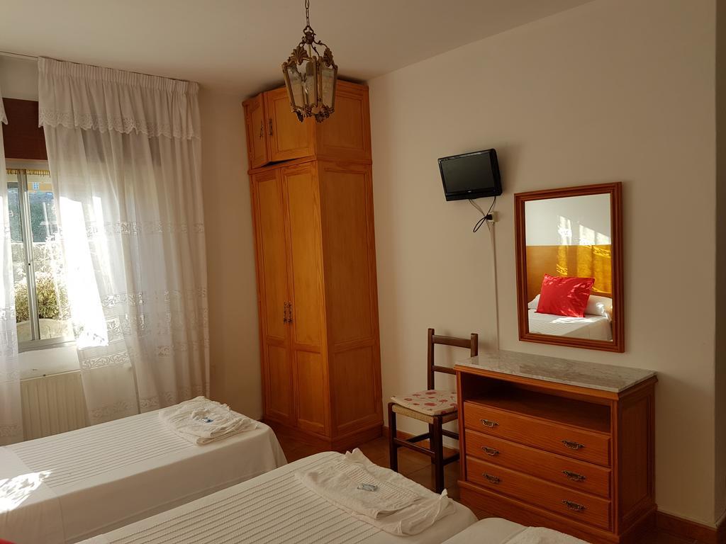 Habitación Triple con aseo compartido
