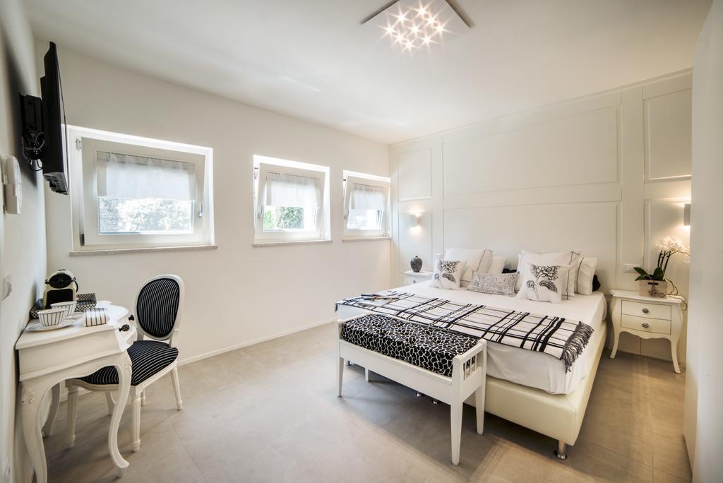 Kamer met 1 Groot Bed of 2 Aparte Bedden en Uitzicht op de Stad