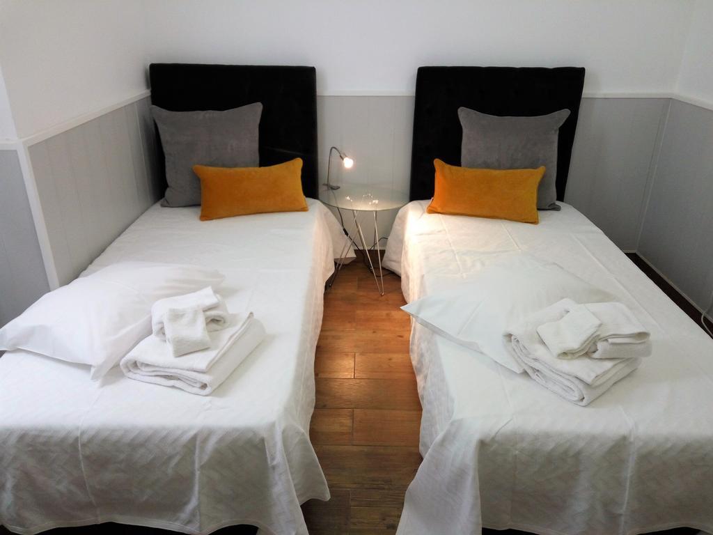 Tweepersoonskamer met 1 of 2 Bedden en Gedeelde Badkamer
