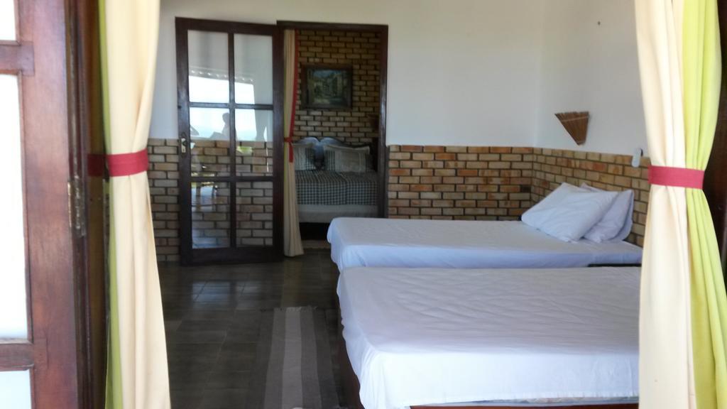 Quarto Quádruplo Superior com Vista para o Mar