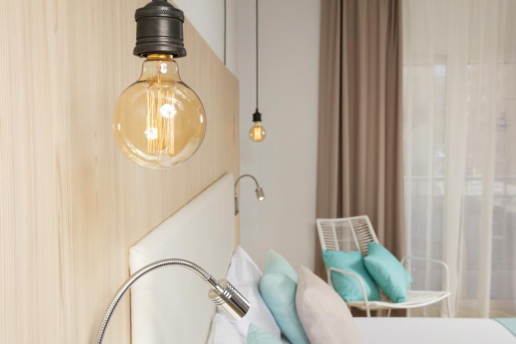 Habitación Doble con cama supletoria con vistas a la piscina