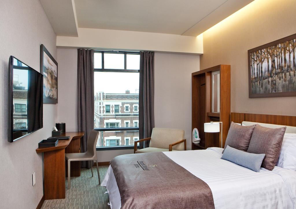 Chambre Lit Queen-Size Deluxe