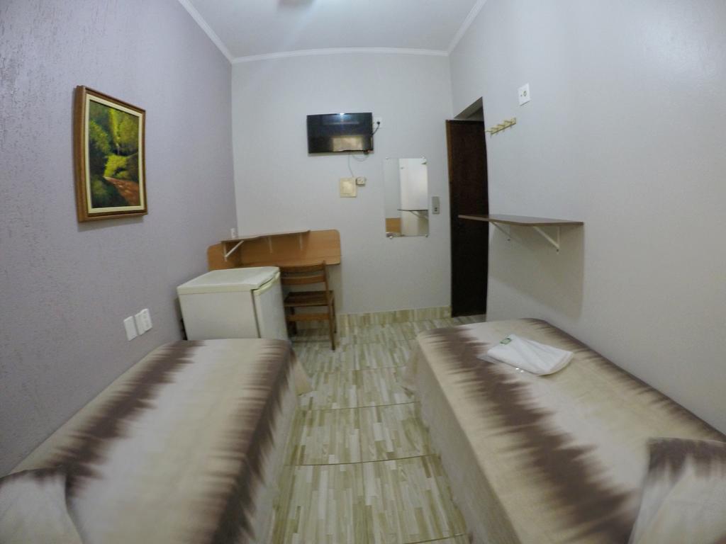 Quarto Individual Econômico