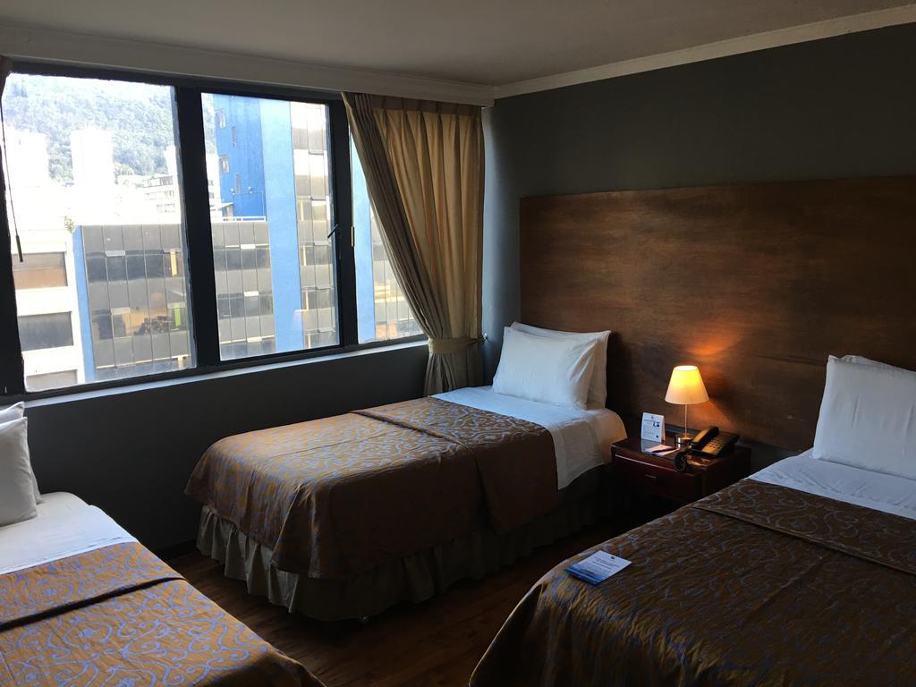 Quarto Triplo Executivo