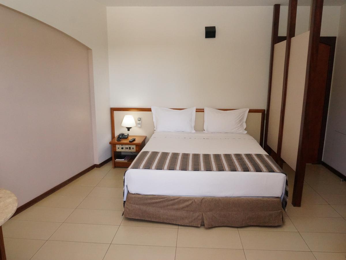 Quarto com Cama Queen-Size e Varanda