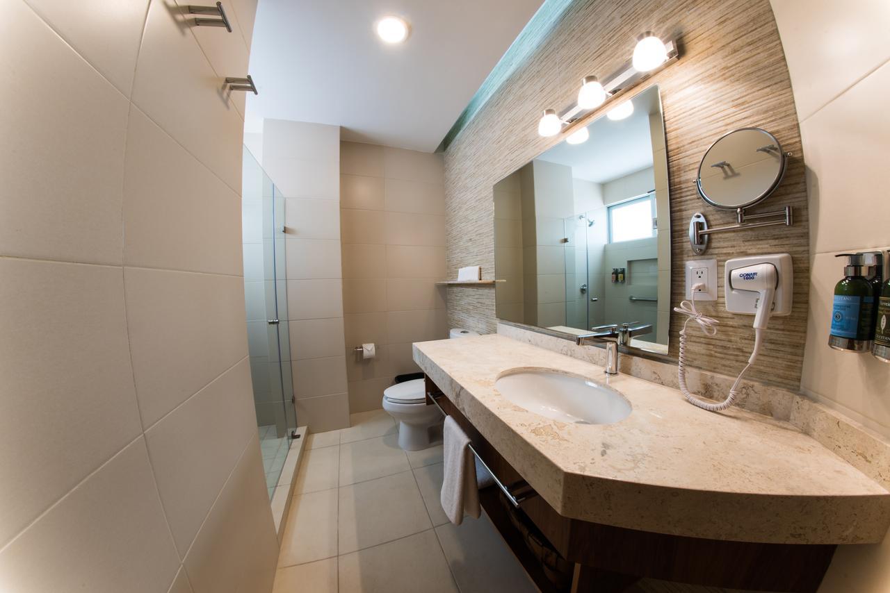 Habitación Deluxe con cama extragrande y sofá cama