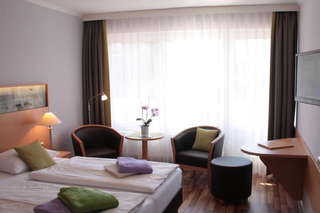 Doppel- oder Zweibettzimmer