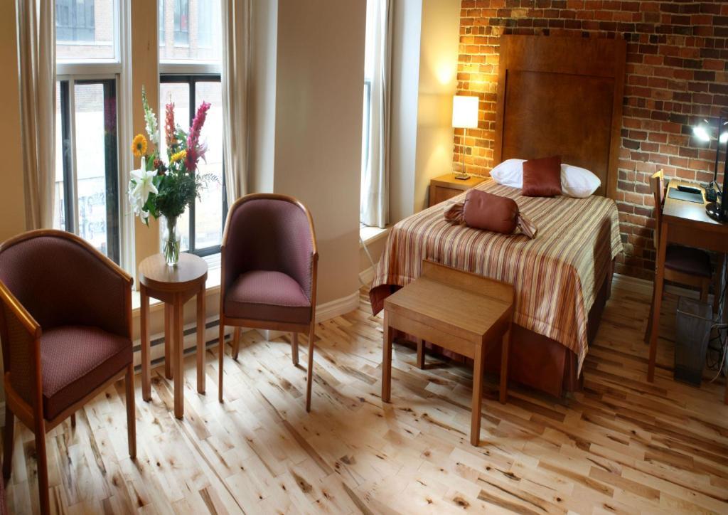 Quarto Queen Superior com Sofá-cama