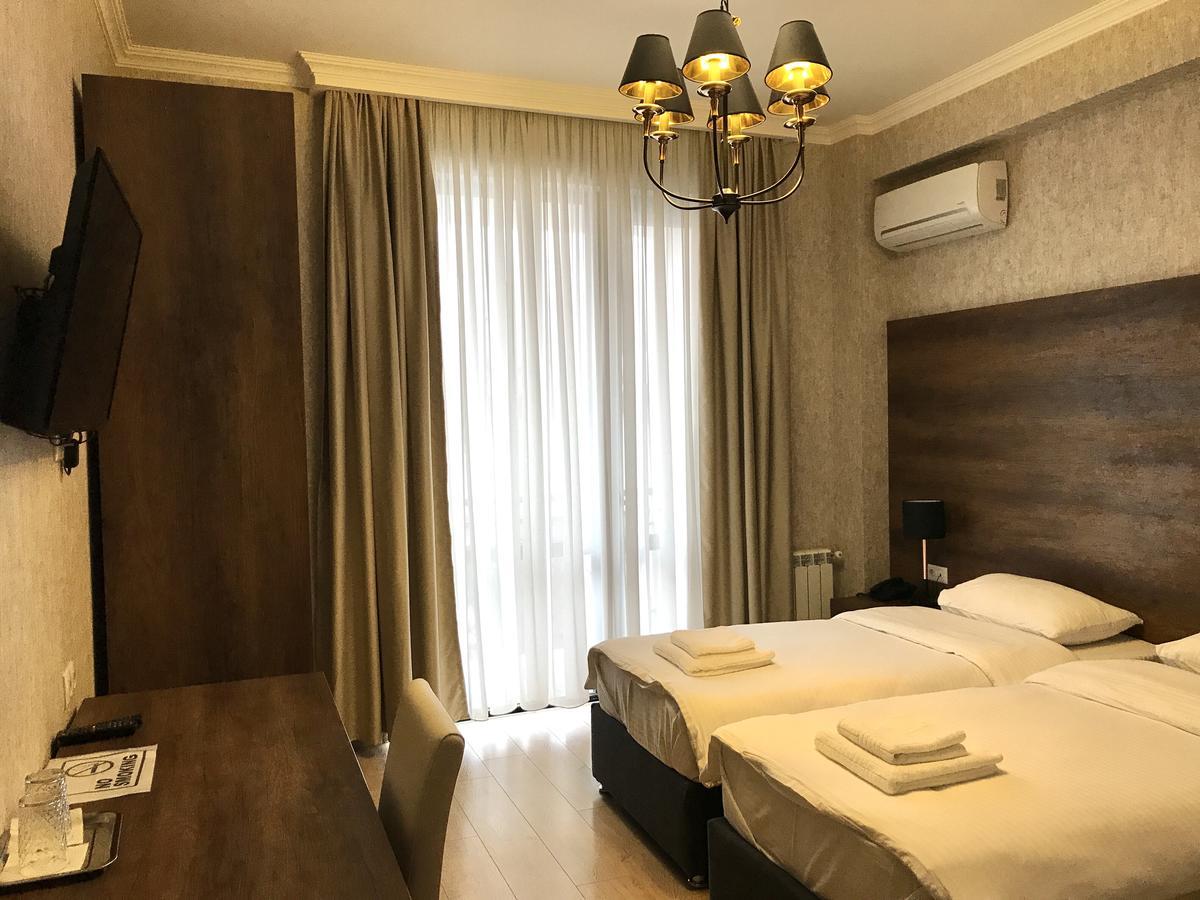 Luxe Kamer met 1 of 2 Bedden en Balkon