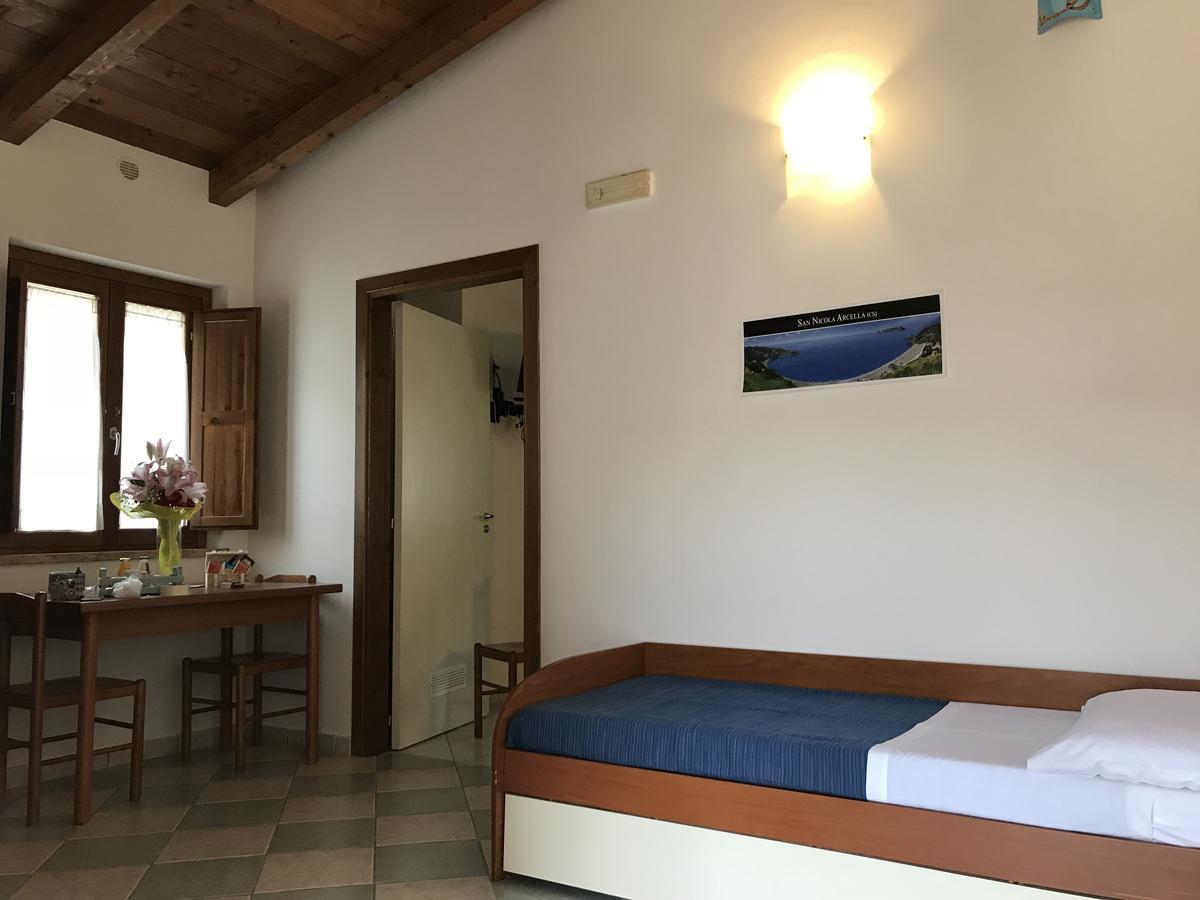 Camera Familiare con Vista Giardino