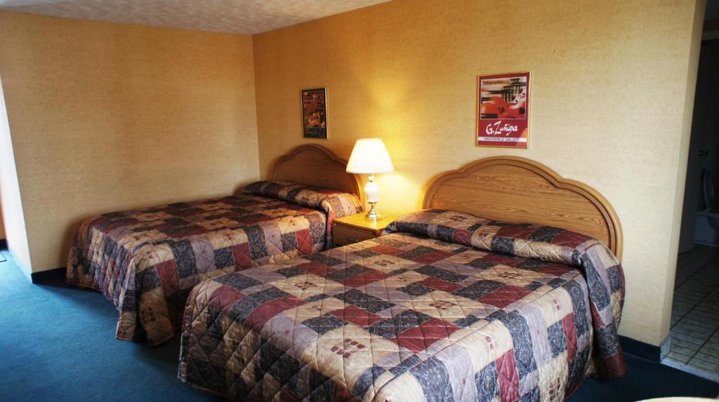 Kamer met 2 Queensize Bedden