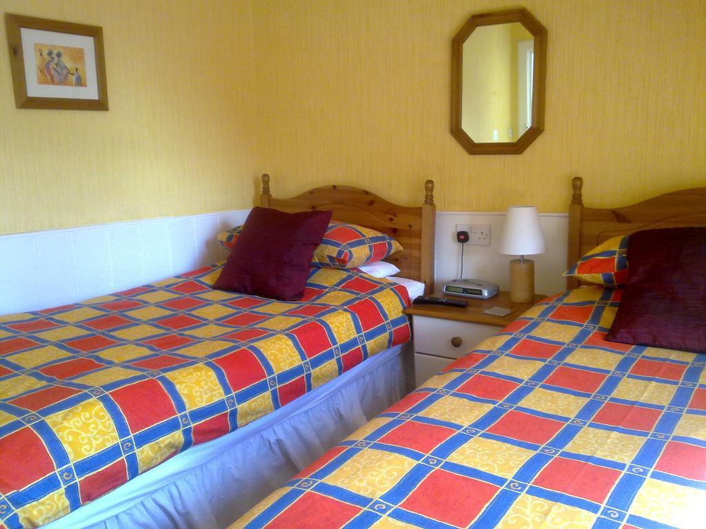 Tweepersoonskamer met 1 of 2 Bedden en Eigen Externe Badkamer