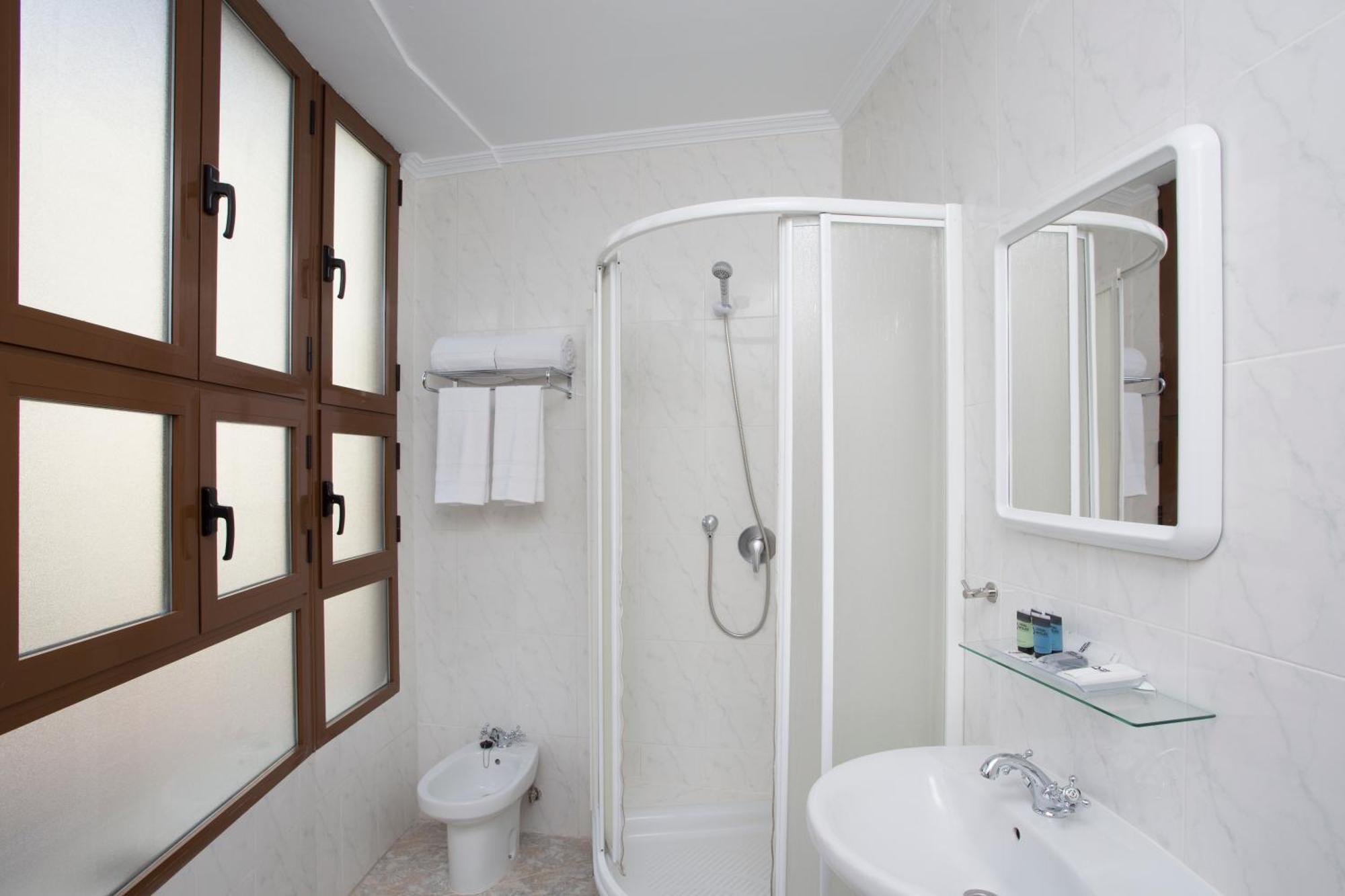Habitación Interior Cuádruple Económica