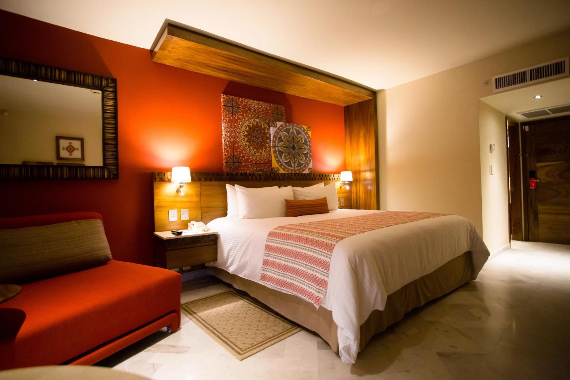 Habitación Deluxe con cama extragrande y vistas parciales al mar