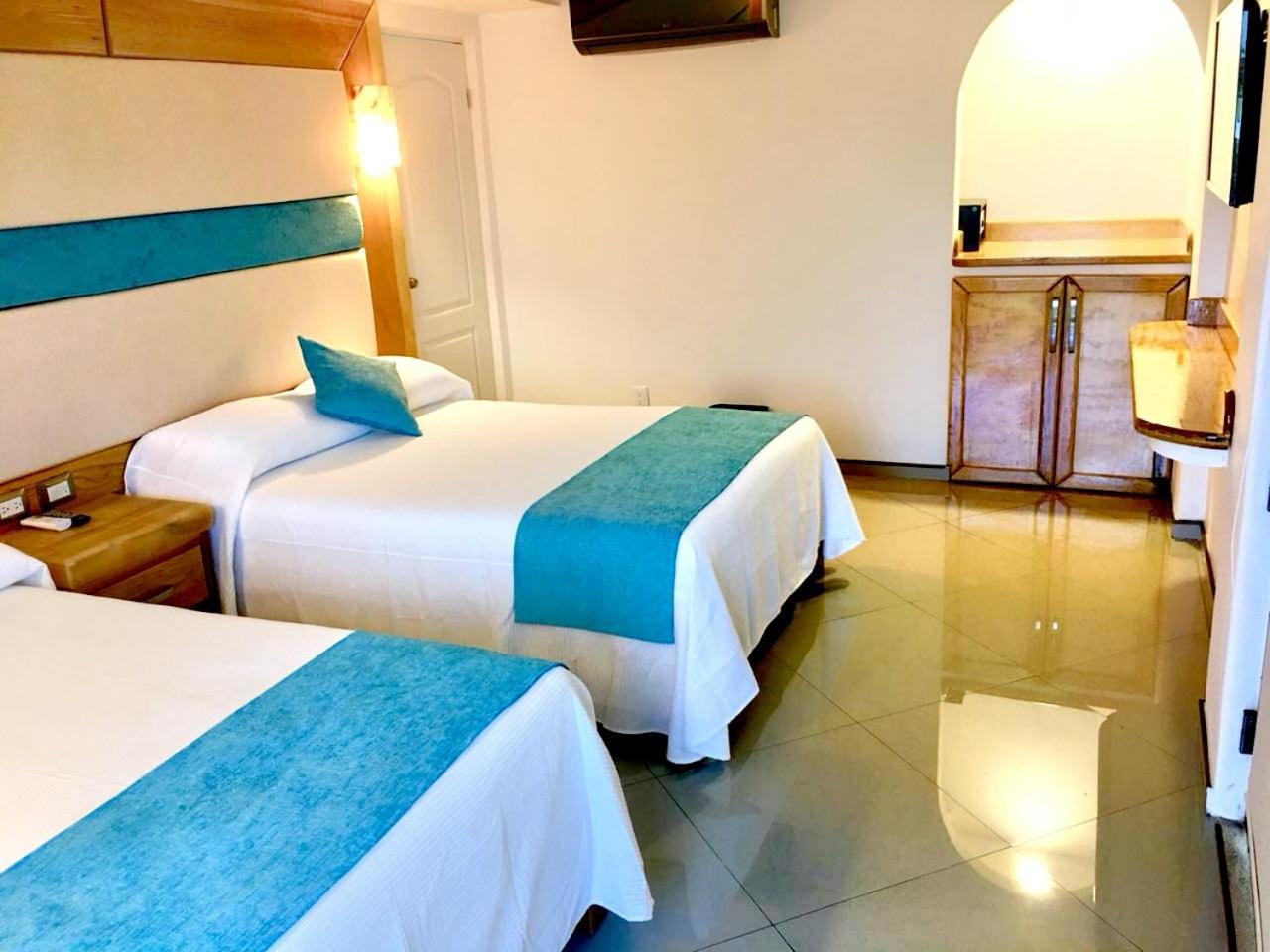 Standaard Kamer met 2 Queensize Bedden