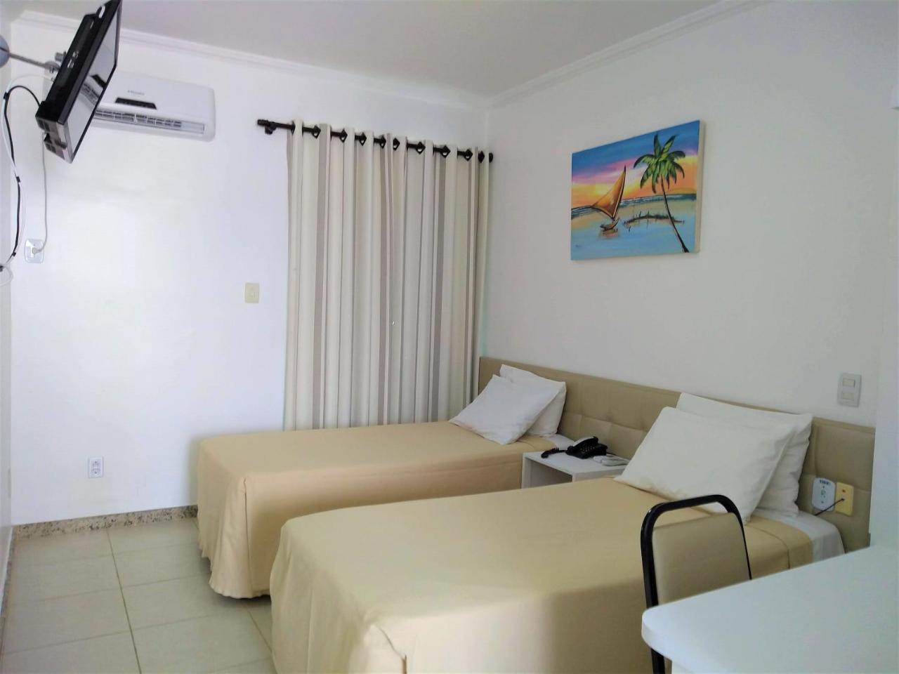 Quarto Standard com Cama de Casal ou 2 de Solteiro