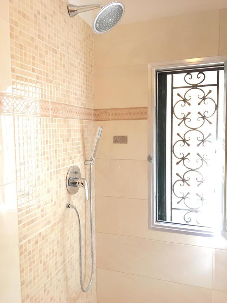 Quadruple Room with Shared Bathroom
