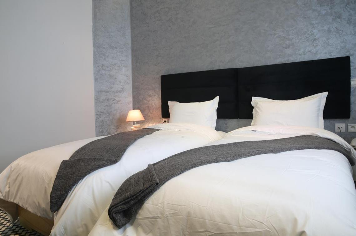 Tweepersoonskamer met 2 Aparte Bedden