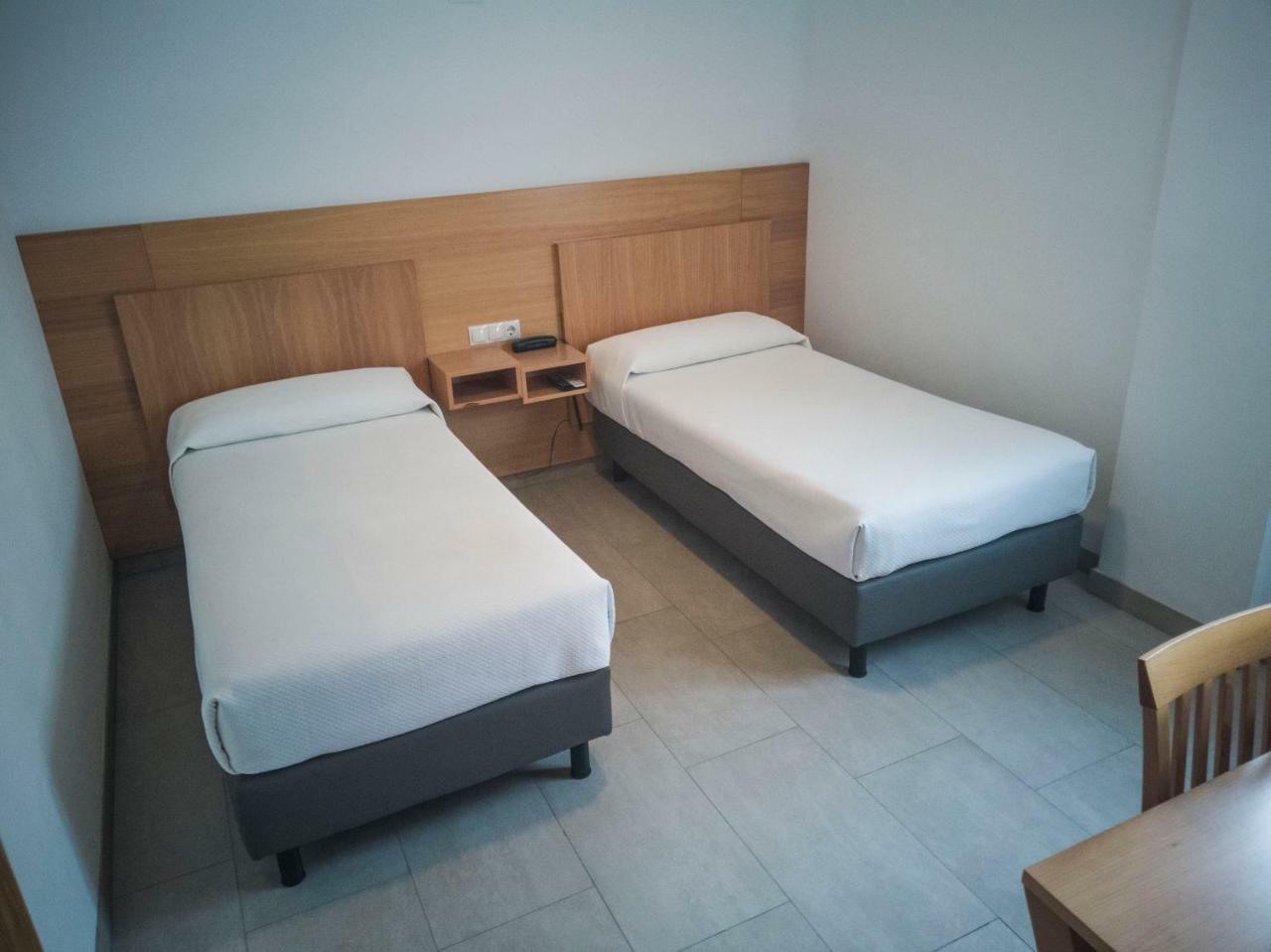 Tweepersoonskamer met 2 Aparte Bedden