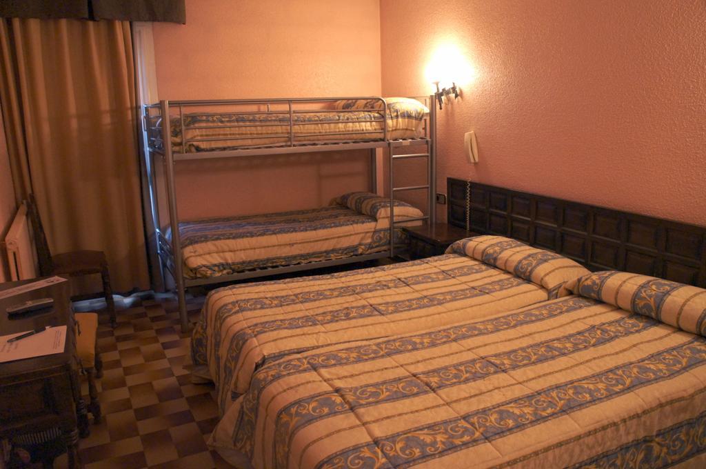 Habitación Cuádruple (2 adultos + 2 niños)