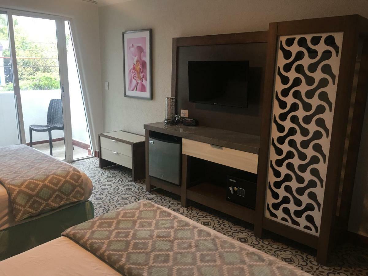 Quarto Duplo com 2 Camas de Casal