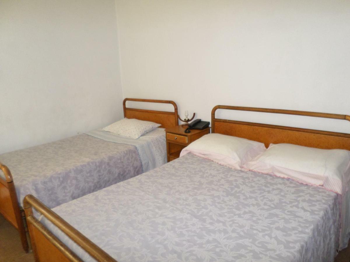 Quarto Triplo com Casa de Banho Privativa