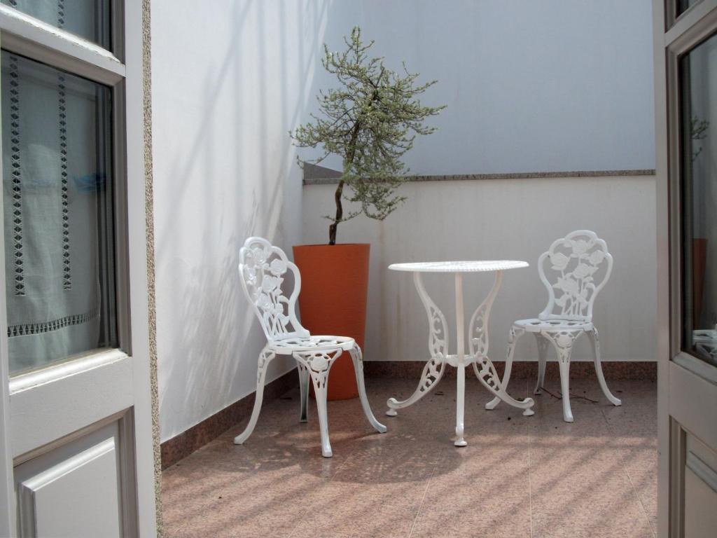 Quarto Duplo com Terraço
