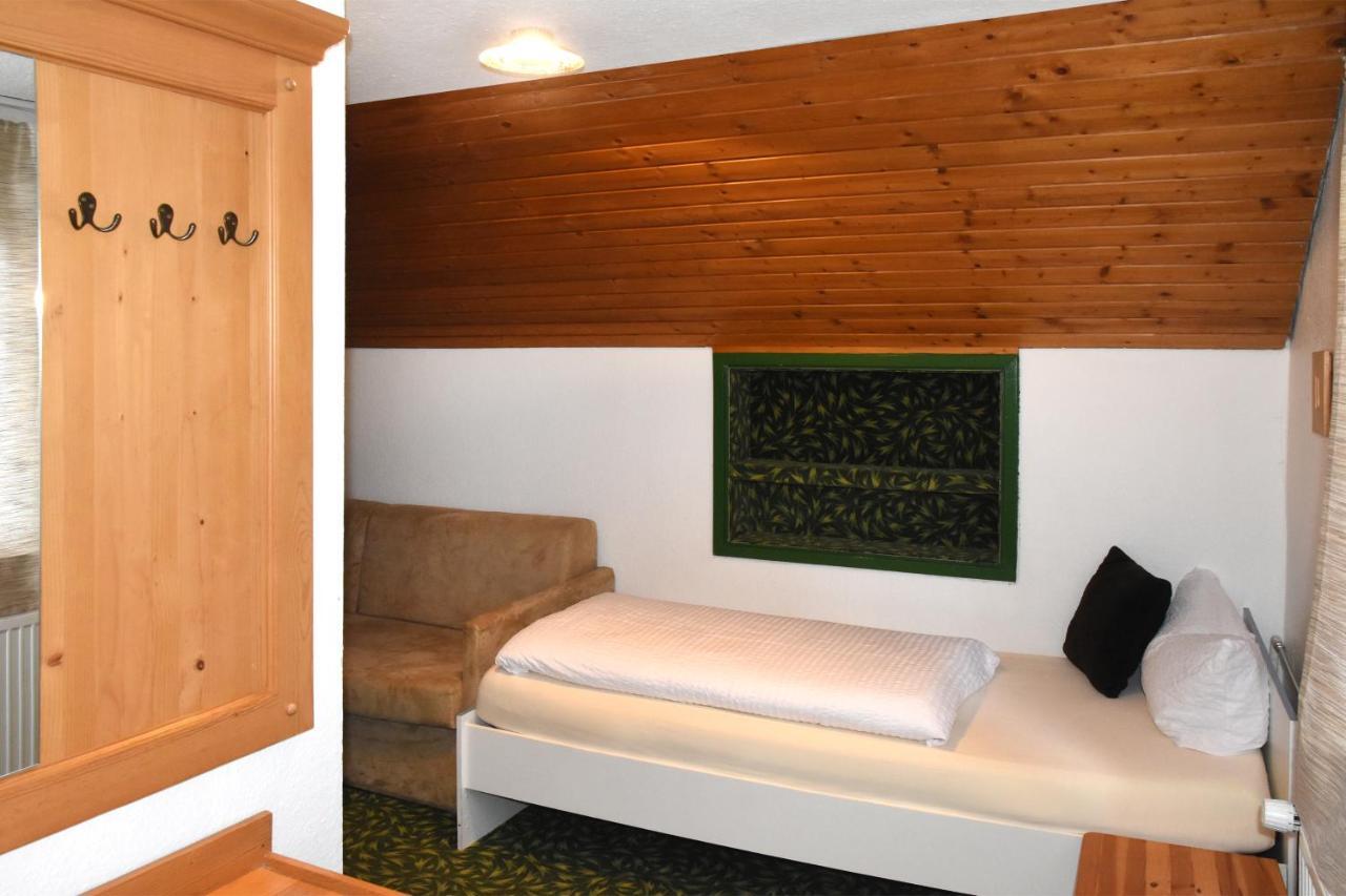 Dreibettzimmer mit Balkon