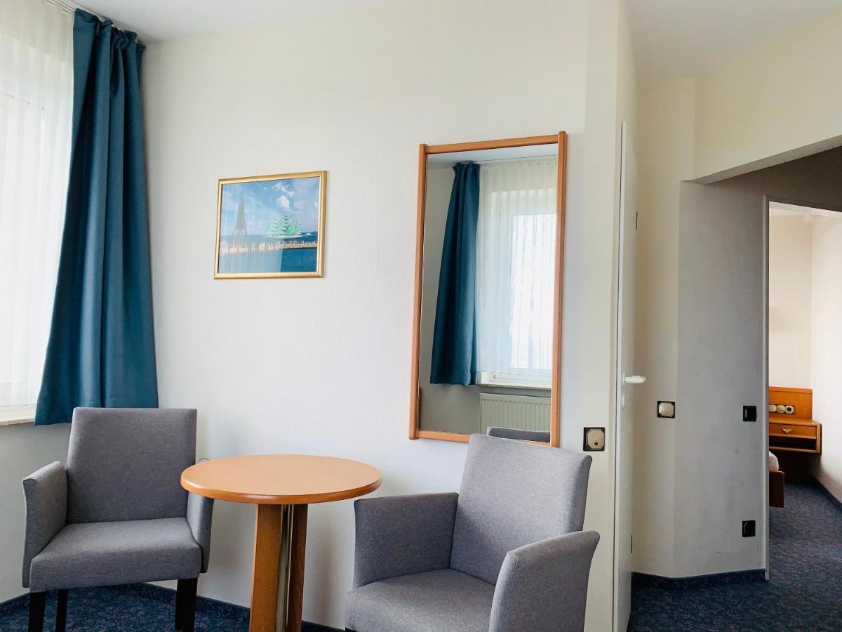 Dreibettzimmer mit Meerblick