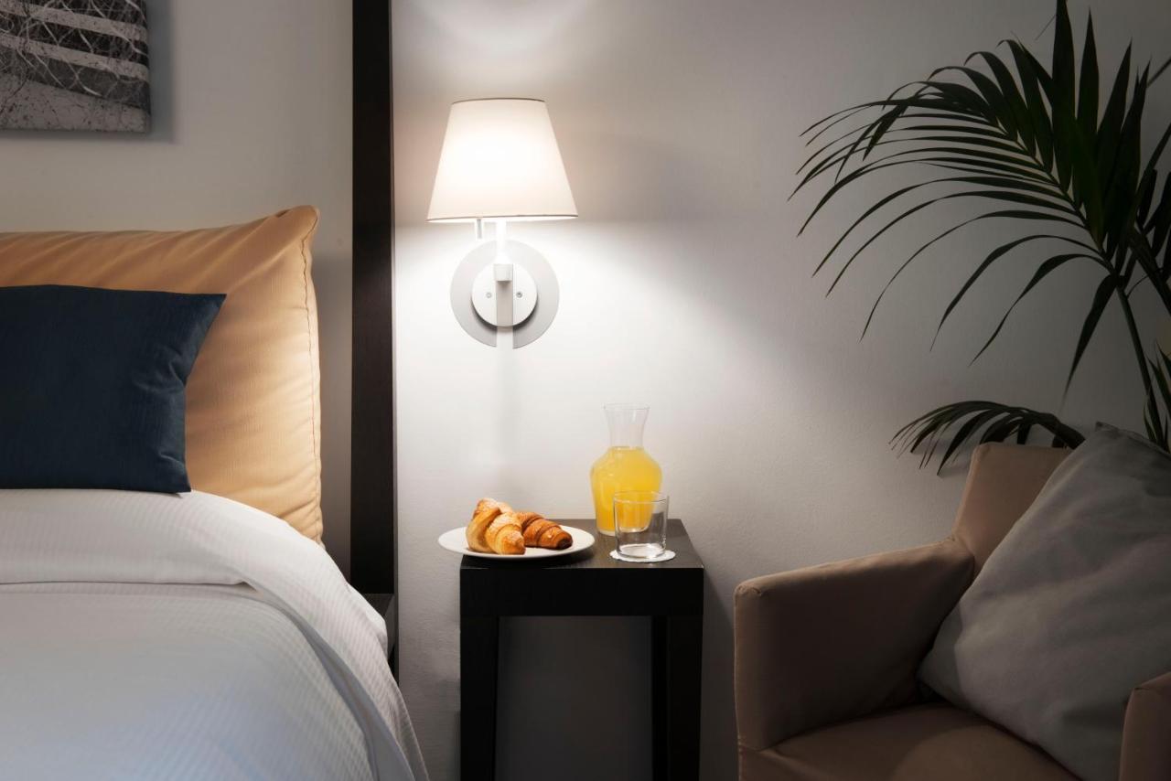 Dreibettzimmer mit eingeschränktem Seeblick